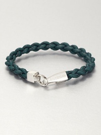 A simple strand of braided genuine Italian leather with matching color stitching and a rhodium plated sterling silver clasp.LeatherSterling silver lobster claspAbout 7 - 7½ longMade in the United Kingdom A simple strand of braided genuine Italian leather with matching color stitching and a rhodium plated sterling silver clasp.LeatherSterling silver lobster claspAbout 7 - 7½ longMade in the United Kingdom