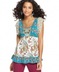 A bevy of beautiful prints gives One World's tunic an exotic feel. Pair it with shorts, capris or this season's colored denim! A bevy of beautiful prints gives One World's tunic an exotic feel. Pair it with shorts, capris or this season's colored denim!