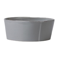 An effortless collection that transitions seamlessly from your kitchen to the table, these exceptional serving dishes solidify your presentation with down-to-earth elegance. Crafted in Tuscany from Italian stoneware, and featuring unique, rustic shapes with modern details, these pieces are built to last, both in terms of style and functionality. An effortless collection that transitions seamlessly from your kitchen to the table, these exceptional serving dishes solidify your presentation with down-to-earth elegance. Crafted in Tuscany from Italian stoneware, and featuring unique, rustic shapes with modern details, these pieces are built to last, both in terms of style and functionality.