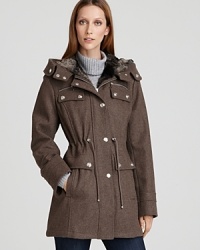 The military trend stays strong with a Laundry by Shelli Segal wool jacket, touting a sharp drawstring waist, silver-tone hardware and warm faux fur lining throughout. The military trend stays strong with a Laundry by Shelli Segal wool jacket, touting a sharp drawstring waist, silver-tone hardware and warm faux fur lining throughout.