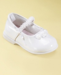 Pretty rosettes make these comfy little First Impressions shoes exceptionally cute. Pretty rosettes make these comfy little First Impressions shoes exceptionally cute.
