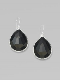 A large faceted drop of black onyx in a sterling silver setting.Black onyx Sterling silver Length, about 1 Width, about ¾ Ear wire Imported 