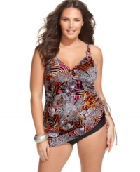 A bold tribal-inspired print gives Christina's plus size swimdress a hot look! Wear it with the side cinched up or down. A bold tribal-inspired print gives Christina's plus size swimdress a hot look! Wear it with the side cinched up or down.
