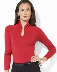A luxurious blend of silk and cotton yarns forms the foundation of this elegant keyhole sweater, crafted with a chic gathered neckline and accented with glistening embroidery. A luxurious blend of silk and cotton yarns forms the foundation of this elegant keyhole sweater, crafted with a chic gathered neckline and accented with glistening embroidery.