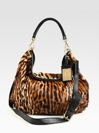 Luxurious animal print haircalf accented with supple leather in a chic slouchy design.Leather top handle, 9½ dropDetachable adjustable leather shoulder strap, 21½-22½ dropMagnetic top closureOne inside zip pocketTwo inside open pocketsSatin lining20W X 17H X 5DMade in Italy