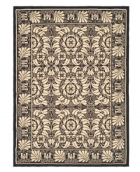 Taking inspiration from Art Nouveau-era designs, the Courtyard area rug boasts a crisp flourish of leaf and scroll patterns that is elegantly European in style. Hand-tufted of pure wool and coupled with a low-profile cut for streamlined, comforting style. (Clearance)