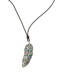 Stand apart from the flock in this free-spirited style. Fossil's fashionable feather pendant features abalone shell inlay and clear crystal pave. Cord crafted from chocolate brown leather with a lobster claw clasp. Approximate length: 24 inches + 2-inch extender. Approximate drop: 2-3/4 inches. Stand apart from the flock in this free-spirited style. Fossil's fashionable feather pendant features abalone shell inlay and clear crystal pave. Cord crafted from chocolate brown leather with a lobster claw clasp. Approximate length: 24 inches + 2-inch extender. Approximate drop: 2-3/4 inches.