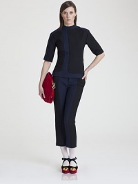 Utterly modern, this sleek sculptural style is impeccably tailored from a luxe silk/wool blend.Modified mock neckShort sleevesPanel constructionConcealed back zip50% silk/50% woolDry cleanMade in Italy of imported fabricModel shown is 5'11 (180cm) wearing US size 4. Utterly modern, this sleek sculptural style is impeccably tailored from a luxe silk/wool blend.Modified mock neckShort sleevesPanel constructionConcealed back zip50% silk/50% woolDry cleanMade in Italy of imported fabricModel shown is 5'11 (180cm) wearing US size 4.