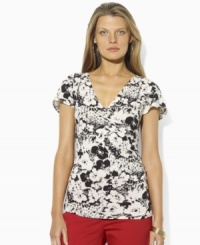 Crafted from lightweight tissue cotton in a figure-flattering faux-wrap design, This Lauren by Ralph Lauren top defines modern femininity in a bold floral-print. Crafted from lightweight tissue cotton in a figure-flattering faux-wrap design, This Lauren by Ralph Lauren top defines modern femininity in a bold floral-print.