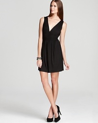 Aqua's simple yet stylish jersey dress lends chic with a v neck and back and a gathered waistband. Aqua's simple yet stylish jersey dress lends chic with a v neck and back and a gathered waistband.