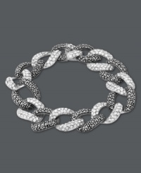 Links of luxury. Overlapping circles adorned with glittering marcasite and sparkling crystals create a luminous look on Genevieve & Grace's glamorous bracelet. Set in sterling silver. Approximate length: 7-1/4 inches. Links of luxury. Overlapping circles adorned with glittering marcasite and sparkling crystals create a luminous look on Genevieve & Grace's glamorous bracelet. Set in sterling silver. Approximate length: 7-1/4 inches.