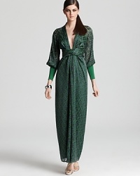 Featuring a deep V-neck and dramatic blouson sleeves, this gorgeously printed Issa London maxi dress guarantees a statement-making entrance. Featuring a deep V-neck and dramatic blouson sleeves, this gorgeously printed Issa London maxi dress guarantees a statement-making entrance.