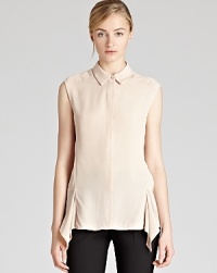 With understated design details coming into play, this REISS sleeveless shirt surprises with a beautiful waterfall hem. Wear it over your skinny jeans or sharp tailored trousers to soften any look. With understated design details coming into play, this REISS sleeveless shirt surprises with a beautiful waterfall hem. Wear it over your skinny jeans or sharp tailored trousers to soften any look.