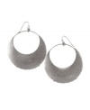 Add stellar style in Jessica Simpson's eclipsing moon drops. Earrings feature cut-out hoops crafted in silver tone mixed metal. Approximate drop: 2 inches.