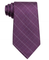 Etched in silk. This grid tie from Calvin Klein will give his buttoned-up look a classic finish.