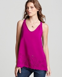 A fanciful floral laser-cut motif elevates this vibrant Aqua racerback tank. Pair it with your favorite skinnies and take it out for cocktails. A fanciful floral laser-cut motif elevates this vibrant Aqua racerback tank. Pair it with your favorite skinnies and take it out for cocktails.