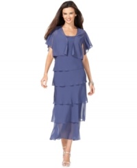 Alex Evenings puts the finishing touch on this petite tiered evening gown with a matching cropped jacket, crafted of sheer material and highlighted with beaded trim. Alex Evenings puts the finishing touch on this petite tiered evening gown with a matching cropped jacket, crafted of sheer material and highlighted with beaded trim.