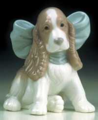 Take man's best friend home--in the form of this adorable sculpted puppy. Take man's best friend home--in the form of this adorable sculpted puppy.