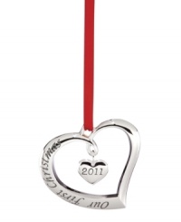 Two hearts in one, the 2011 Our First Christmas ornament is all about celebrating with the one you love. A romantic gift, crafted in lustrous silver plate by Lenox. (Clearance) Two hearts in one, the 2011 Our First Christmas ornament is all about celebrating with the one you love. A romantic gift, crafted in lustrous silver plate by Lenox. (Clearance)