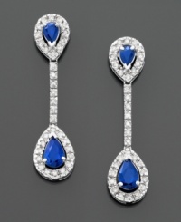 These luxurious drop earrings make a glam statement. Teardrop-cut sapphires (9/10 ct. t.w.) and round-cut diamonds (1/3 ct. t.w.) are set in 14k white gold. Drop measures 1-1/4 inches. These luxurious drop earrings make a glam statement. Teardrop-cut sapphires (9/10 ct. t.w.) and round-cut diamonds (1/3 ct. t.w.) are set in 14k white gold. Drop measures 1-1/4 inches.