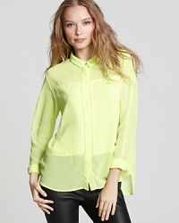Borrowing from the colorful neon days of the eighties, this vibrant PJK Patterson J. Kincaid top is slightly sheet with oversized front patches and an edgy asymmetric hem--just add denim. Borrowing from the colorful neon days of the eighties, this vibrant PJK Patterson J. Kincaid top is slightly sheet with oversized front patches and an edgy asymmetric hem--just add denim.