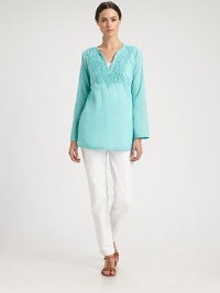 A fashion staple, this cotton top combines the ease of a relaxed fit with the elegance of embroidery.Embroidered v-necklineLong sleevesPull-on styleAbout 27 from shoulder to hemCottonHand washImported Model shown is 5'10 (177cm) wearing US size Small. A fashion staple, this cotton top combines the ease of a relaxed fit with the elegance of embroidery.Embroidered v-necklineLong sleevesPull-on styleAbout 27 from shoulder to hemCottonHand washImported Model shown is 5'10 (177cm) wearing US size Small.