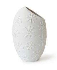 A modern shape and askew opening in matte white porcelain make the Charade Slice vase from Jonathan Adler a must for artful arrangements. A modern shape and askew opening in matte white porcelain make the Charade Slice vase from Jonathan Adler a must for artful arrangements.