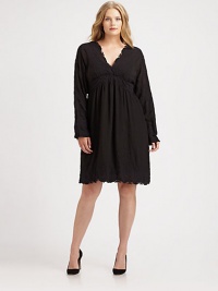 Leave it to a timeless Empire waist to flawlessly complement your silhouette. This dress also features pretty embroidery and delicate scalloped trim.V-neckLong sleevesEmpire waistCotton slip includedPull-on styleSelf belt ties at backAbout 27 from natural waistRayonMachine washImported Leave it to a timeless Empire waist to flawlessly complement your silhouette. This dress also features pretty embroidery and delicate scalloped trim.V-neckLong sleevesEmpire waistCotton slip includedPull-on styleSelf belt ties at backAbout 27 from natural waistRayonMachine washImported