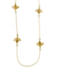 This style is sweet as honey. 2028's vintage-themed long strand necklace features ivory-colored acrylic pearls and intricate bumblebee charms. Crafted in gold-plated mixed metal. Approximate length: 48 inches. This style is sweet as honey. 2028's vintage-themed long strand necklace features ivory-colored acrylic pearls and intricate bumblebee charms. Crafted in gold-plated mixed metal. Approximate length: 48 inches.