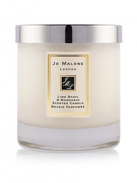 Reminiscent of the scent of limes carried on a Caribbean Sea breeze, this unisex scent combines fresh limes with mandarin, peppery basil and aromatic white thyme. Lime Basil & Mandarin Home Candle infuses any room with an evocative scent that lasts for hours. Lid included. 7 oz. Reminiscent of the scent of limes carried on a Caribbean Sea breeze, this unisex scent combines fresh limes with mandarin, peppery basil and aromatic white thyme. Lime Basil & Mandarin Home Candle infuses any room with an evocative scent that lasts for hours. Lid included. 7 oz.
