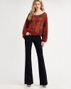 A pretty ink-dot print highlights this silk blouson topper.ScoopneckDropped shouldersGathered dolman sleevesElastic waistAbout 23 from shoulder to hemSilkDry cleanImportedModel shown is 5'11 (180cm) wearing US size 4.