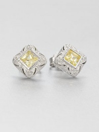 From the Estate Collection. Beautifully faceted canary crystal stones set in intricately designed, sterling silver. Canary crystalSterling silverSize, about .5Post backImported From the Estate Collection. Beautifully faceted canary crystal stones set in intricately designed, sterling silver. Canary crystalSterling silverSize, about .5Post backImported