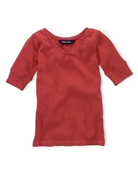 A soft ribbed cotton jersey top is updated for a pretty look with lace trim and a ribbon accent at the neckline. A soft ribbed cotton jersey top is updated for a pretty look with lace trim and a ribbon accent at the neckline.