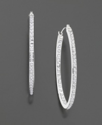 Put a little sparkle in your everyday look. These hoop earrings feature a round-cut diamond-accent design set in 14k white gold. Measures 1-1/2 inches. Put a little sparkle in your everyday look. These hoop earrings feature a round-cut diamond-accent design set in 14k white gold. Measures 1-1/2 inches.