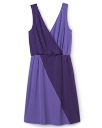 A vision in purple, this faux wrap-front dress by Un Deux Trois is a mix of sophisticated styling that remains playful and age appropriate. A vision in purple, this faux wrap-front dress by Un Deux Trois is a mix of sophisticated styling that remains playful and age appropriate.