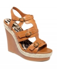 Leather and espadrille, buckles and straps. Jessica Simpson's Mack wedge sandals are a mixed bag of beauty. Leather and espadrille, buckles and straps. Jessica Simpson's Mack wedge sandals are a mixed bag of beauty.