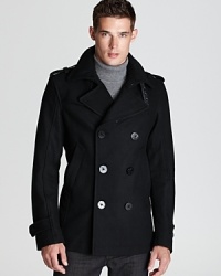 The classic pea coat gets the modern treatment with this strikingly masculine design from Diesel, full of vintage inspiration and contemporary appeal. The classic pea coat gets the modern treatment with this strikingly masculine design from Diesel, full of vintage inspiration and contemporary appeal.