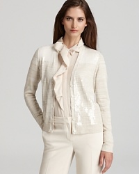 Shimmering sequins lend chic luster to a classic Jones New York Collection cardigan for a luminous approach to layering. Shimmering sequins lend chic luster to a classic Jones New York Collection cardigan for a luminous approach to layering.