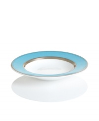 Get away from ordinary dining with dreamy Lauderdale dinnerware by Cru. Shimmering platinum dots and bands contrast swaths of sea blue on this fuss-free, dishwasher-safe rim soup bowl inspired by a favorite Floridian retreat.