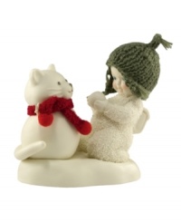 Crafted of pure bisque porcelain, this precious figurine is hand-painted and continues the Snowbabies tradition of lasting childhood innocence and joy. Fine knitted detailing enhances its lovable charm. Crafted of pure bisque porcelain, this precious figurine is hand-painted and continues the Snowbabies tradition of lasting childhood innocence and joy. Fine knitted detailing enhances its lovable charm.