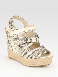 Snake-print leather complemented by an adjustable slingback strap and a timeless espadrille wedge. Leather and hemp wedge, 4½ (115mm)Hemp platform, 1 (25mm)Compares to a 3½ heel (90mm)Snake-print leather upperLeather lining and solePadded insoleImported Snake-print leather complemented by an adjustable slingback strap and a timeless espadrille wedge. Leather and hemp wedge, 4½ (115mm)Hemp platform, 1 (25mm)Compares to a 3½ heel (90mm)Snake-print leather upperLeather lining and solePadded insoleImported