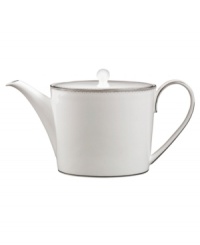 Set a dazzling tea or coffee service with this fine china teapot. From innovative designer Monique Lhullier, it features a platinum-edged tiered scallop pattern on creamy white. Set a dazzling tea or coffee service with this fine china teapot. From innovative designer Monique Lhullier, it features a platinum-edged tiered scallop pattern on creamy white.