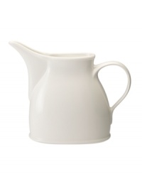 Vintage charm meets modern durability in the oversized Farmhouse Touch pitcher, featuring a crisp white glaze in premium porcelain from Villeroy & Boch. Vintage charm meets modern durability in the oversized Farmhouse Touch pitcher, featuring a crisp white glaze in premium porcelain from Villeroy & Boch.