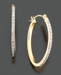 Classic elegance. Every girl must have a pair of these 14k gold diamond-accented oval-shaped hoop earrings. Approximate diameter: 1-3/4 inches. Classic elegance. Every girl must have a pair of these 14k gold diamond-accented oval-shaped hoop earrings. Approximate diameter: 1-3/4 inches.