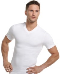 In a slimming stretch cotton blend, One Flat Jack's compression V neck t-shirt pulls double duty so you can lose the extra baggage and wick away moisture for a cool burst of confidence. In a slimming stretch cotton blend, One Flat Jack's compression V neck t-shirt pulls double duty so you can lose the extra baggage and wick away moisture for a cool burst of confidence.