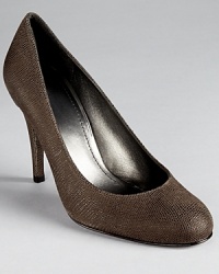 Lightly textured, Stuart Weitzman's Swoon Goosebump pumps lend classic style with a modern twist. Lightly textured, Stuart Weitzman's Swoon Goosebump pumps lend classic style with a modern twist.