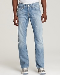 Faded for a worn-in appearance with rugged distressing, these jeans maximize your style. Pair them with a polo or pocket tee for a reliably classic look. Faded for a worn-in appearance with rugged distressing, these jeans maximize your style. Pair them with a polo or pocket tee for a reliably classic look.