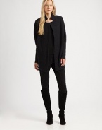 Made from luxurious merino wool, this simply sophisticated coat offers clean lines and an ever-stylish stand collar.Stand collarLong sleevesButton closureConvenient slash pocketsAbout 32 from shoulder to hemBody: merino woolSleeves: merino wool/nylon/spandexDry cleanImported Model shown is 5'10 (177cm) wearing US size Small. 