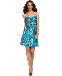 Adrianna Papell's dress is sublime for summertime special occasions with its strapless silhouette and ocean-inspired hues. Adrianna Papell's dress is sublime for summertime special occasions with its strapless silhouette and ocean-inspired hues.