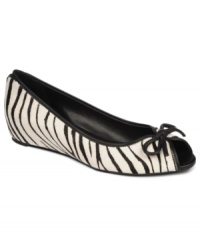 Flounce about in your pretty shoes. The Model flats by Franco Sarto feature a pretty peep-toe and a cute bow at the top. Flounce about in your pretty shoes. The Model flats by Franco Sarto feature a pretty peep-toe and a cute bow at the top.